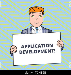 Signe texte montrant le développement d'applications. Photo d'affaires mettant en valeur la création d'applications informatiques pour une utilisation sur les appareils mobiles Smiling Man Holding Su formel Banque D'Images