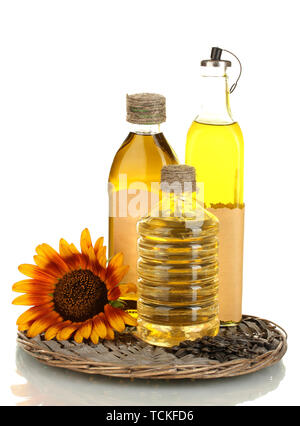 En bouteilles d'huile, le tournesol et graines isolated on white Banque D'Images