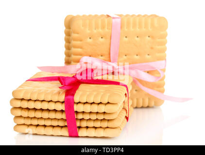 Sweet cookies attachées avec un ruban rose isolated on white Banque D'Images