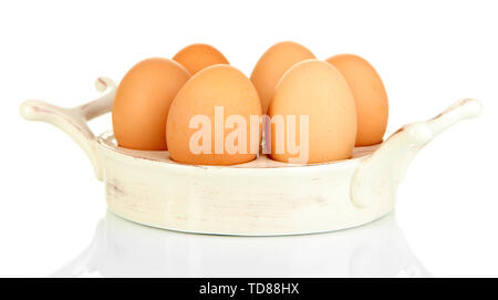 Les œufs de la plaque pour les oeufs isolated on white Banque D'Images