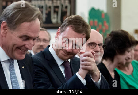 Leipzig, Allemagne. 14 juin 2019. : Burkhard Jung (SPD, l-r), Maire de Leipzig, Michael Kretschmer (CDU), premier ministre de Saxe, et Ton Koopmann, Président de la Fondation Archives Bach, sont à la suite de l'ouverture de le festival Bach à Leipzig's église Saint-Thomas. La devise du festival pour 2019 est 'Hof-Compositeur Bach'. Avant que le compositeur est devenu Thomaskantor, il est employé à la cour depuis de nombreuses années.  : Hendrik Schmidt/dpa-Zentralbild/dpa/Alamy live news Banque D'Images