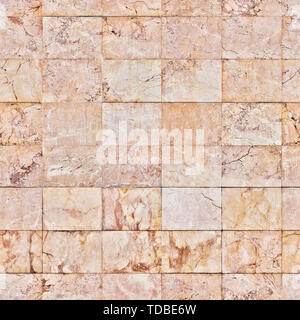 Un fragment des murs de la chambre sont recouverts de carreaux de céramique qui imitent la pierre naturelle. Banque D'Images