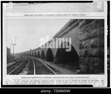 - Améliorations Pennsylvania Railroad, brique Arch Viaduc, Liberty Street à Baltimore and Ohio Railroad, Wilmington, New Castle Comté, DE ; Anglais : La nouvelle rampe de Wilmington viaduc de la Philadelphie, Baltimore et Washington Railroad (Pennsylvania Railroad). Le pilier en pierre à droite, pour les Linden Street Bridge derrière le photographe, marque l'extrémité nord de la viaduc en brique et le début de la construction d'un mur de soutènement et de remplissage. L'au milieu et à droite les voies au niveau du sol sont l'ancienne ligne principale PB&W ; l'un de ces morceaux a été retiré après l'achèvement du viaduc et Banque D'Images