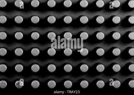 Macro image des nodules d'une pièce en caoutchouc noir mat Banque D'Images
