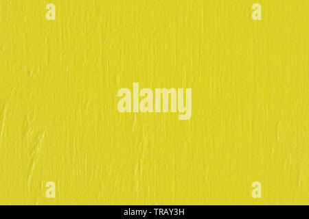 Macro image d'un panneau de fond en bois peint jaune Banque D'Images