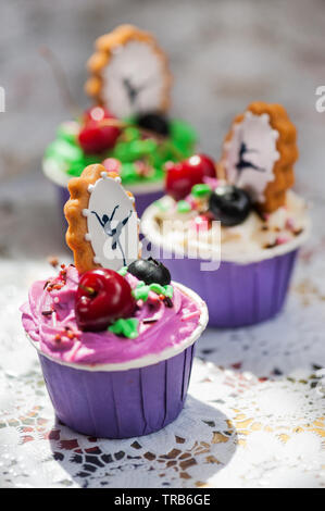 Cupcakes aux fruits rouges et d'épice décoratif Banque D'Images