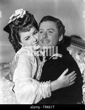 Errol Flynn comme George Armstrong Custer et Olivia de Havilland comme Elizabeth Bacon Custer ILS SONT MORTS AVEC LEURS BOTTES 1941 réalisateur Raoul Walsh Warner Bros. Banque D'Images