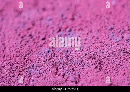Pigment poudre rose fond macro texture art Banque D'Images