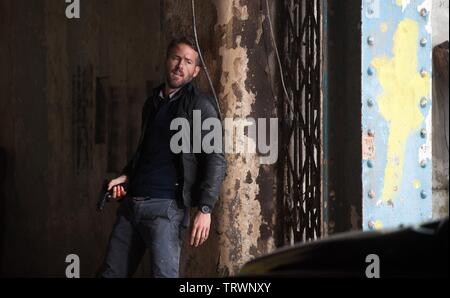 RYAN REYNOLDS EN MATIÈRE PÉNALE (2016). Copyright : Editorial uniquement. Pas de merchandising ou des couvertures de livres. C'est un document distribué au public. Les droits d'accès uniquement, aucune licence de droit d'auteur prévue. Seulement pour être reproduit dans le cadre de la promotion de ce film. Credit : BENDERSPINK/CAMPBELL GROBMAN FILMS/LIONSGATE/MALLENIUM FILMS / Album Banque D'Images