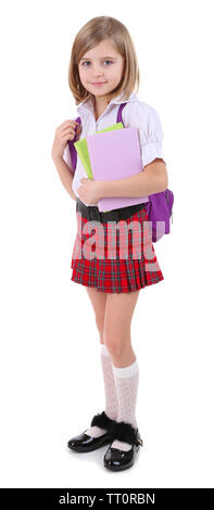 Belle petite fille avec sac à dos holding books isolated on white Banque D'Images