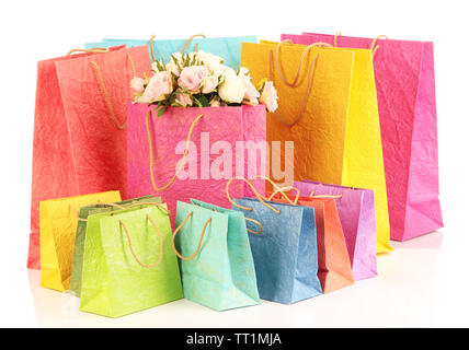 Des sacs colorés et des fleurs, isolated on white Banque D'Images