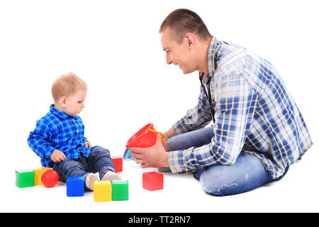 Heureux jeune père jouant avec petit-fils isolated on white Banque D'Images