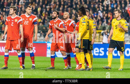 Bruxelles, Belgique - le 21 mars 2019. La Russie les joueurs Mario Fernandes, Artem Dzyuba, Georgi Dzhikiya, Fedor Kudryashov contre Belgique joueurs Dedryck Bo Banque D'Images