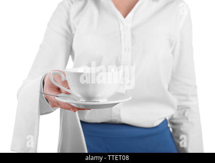 Garçon avec une tasse de thé sur fond blanc Banque D'Images