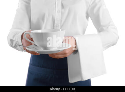 Garçon avec une tasse de thé sur fond blanc Banque D'Images