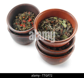 Variété de thé sec en pots isolated on white Banque D'Images
