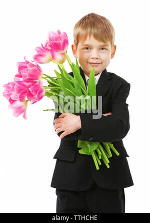 Écolier avec bouquet de magnifiques tulipes isolated on white Banque D'Images