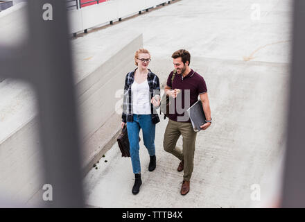 High angle view of business people walking on road in city Banque D'Images