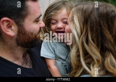 Close-up of happy family at backyard Banque D'Images