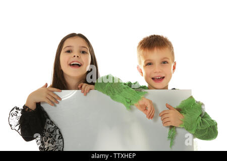 Cute kids avec bannière sur fond clair. Concept d'Halloween Banque D'Images