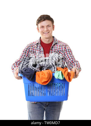 Happy man Holding boîte en plastique avec des vêtements sur fond blanc Banque D'Images