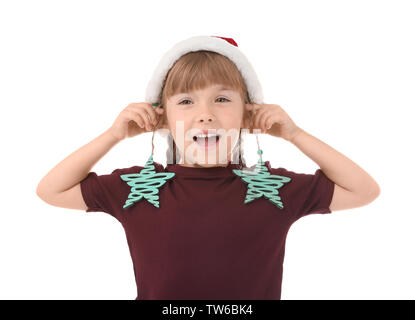 Jolie petite fille avec un décor de Noël sur fond blanc Banque D'Images