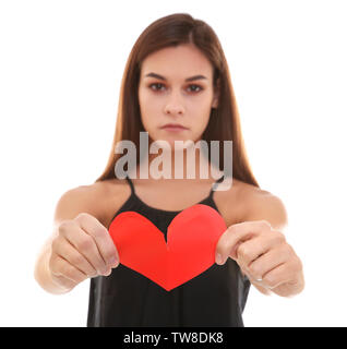 Femme malheureuse déchirure papier sur fond blanc. Liquidation concept Banque D'Images