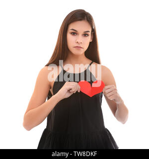 Femme malheureuse déchirure papier sur fond blanc. Liquidation concept Banque D'Images