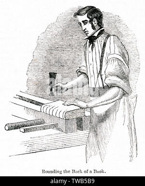 Scène dans un atelier de reliure, City of London Banque D'Images