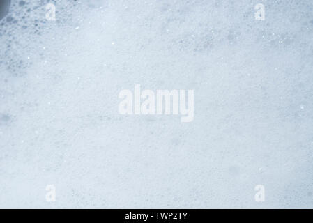 Détergent Savon mousse sur gros plan en verre Banque D'Images