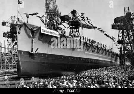 Admiral Graf Spee ironclad lancé sur 30.06.1934 au chantier naval de la Kriegsmarine à Wilhelmshaven. Les diapositives de la cale de navire à la construction du port. Marines et les civils regarder le spectacle. Dans le monde d'utilisation | Banque D'Images