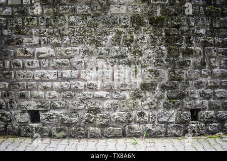 Blocs de pierre ancienne forteresse modèle sur la surface du mur. Pierre gris avec fond style médiévale européenne. Stock photo style avec abstract textur Banque D'Images