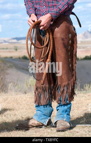 Cowboy avec chap et whip, South Dakota, USA Banque D'Images