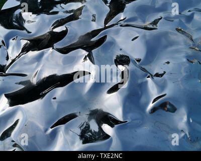 Texture de fond réflexion liquide métallique Banque D'Images