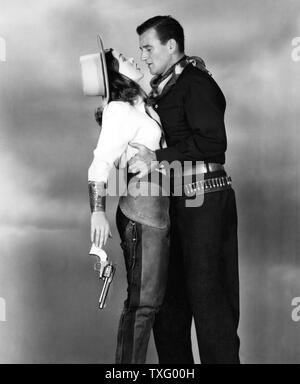 Tall dans la Selle Année : 1944 USA Réalisateur : Edwin L. Marin John Wayne, Ella Raines Banque D'Images