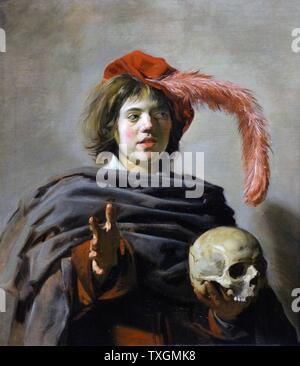La peinture intitulée 'Jeune homme tenant un crâne (Vanitas) par Frans Hals l'ancien (1580-166) Âge d'or hollandais peintre portraitiste. En date du 17e siècle Banque D'Images