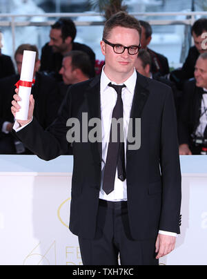 Nicolas Winding Refn arrive à la bourse photocall après avoir reçu le prix "Meilleur Réalisateur" pour le film 'DRIVE' lors de la 64e assemblée annuelle du Festival International du Film de Cannes à Cannes, France le 22 mai 2011. UPI/David Silpa Banque D'Images