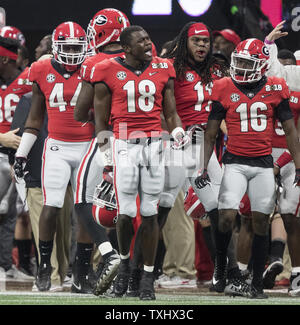 Georgia Bulldogs arrière défensif Deandre Baker (18) gegs marqué pour une célébration excessive après l'interception d'une passe de l'Alabama dans le troisième trimestre de la NCAA College Football Championnat National des éliminatoires de Mercedes-Benz Stadium le 8 janvier 2018 à Atlanta. Photo par Mark Wallheiser/UPI Banque D'Images