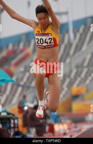 DATE DE CORRECTION DE LA CHINE - Qian Li remporte la médaille de bronze dans l'épreuve féminine du triple saut lors des 15e Jeux Asiatiques à Doha au Qatar, le lundi, 11 décembre 2006. 13 000 athlètes de 39 pays sont en compétition dans 45 épreuves sportives sur deux semaines. Les jeux prendront fin le 15 décembre. (Photo d'UPI/Norbert Schiller) Banque D'Images