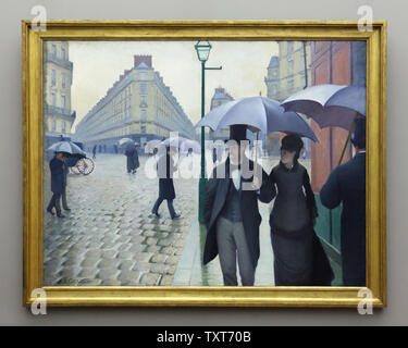 Peinture 'Rue de Paris. Jour de pluie' par le peintre impressionniste Gustave Caillebotte (1877) sur l'affichage à son exposition à la Alte Nationalgalerie (ancienne Galerie Nationale) à Berlin, Allemagne. Banque D'Images