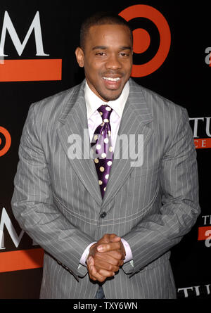 L'acteur Duane Martin, qui stars dans la comédie romantique motion photo 'Seat', arrive pour la première du film au El Capitan Theatre dans la section Hollywood de Los Angeles, le 22 février 2004. Martin a également co-écrit le film avec sa femme Tisha Campbell Martin et Mark Brown. (Photo d'UPI/Jim Ruymen) Banque D'Images