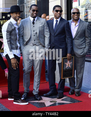 Chanteur Usher Raymond, homme d'affaires/chanteur Sean Combs, auteur-compositeur/producteur Kenny "Babyface" Edmonds et producteur Antonio "L.A." Reid participer à une cérémonie de dévoilement d'honorer avec l'Edmonds 2,508ème étoile sur le Hollywood Walk of Fame à Los Angeles le 10 octobre 2013. UPI/Jim Ruymen Banque D'Images