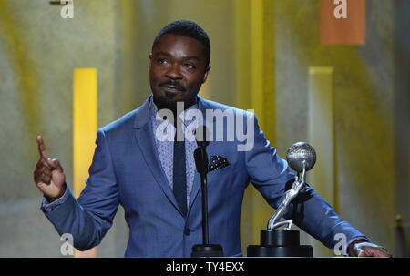 L'acteur anglais David Oyelowo reçoit le prix pour son second rôle dans un film pour 'Lee Daniels' Le Butler' sur scène lors de la 45ème NAACP Image Awards au Pasadena Civic Auditorium à Pasadena, Californie le 22 février 2014. La NAACP Image Awards célèbre les réalisations de personnes de couleur dans les domaines de la télévision, la musique, la littérature et le cinéma et aussi rend hommage à des personnes ou des groupes qui font la promotion de la justice sociale par le biais de projets créatifs. UPI/Jim Ruymen Banque D'Images