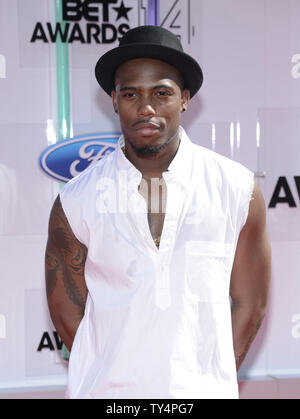 L'artiste hip hop B.o.B assiste à la 14e édition du Nokia Theater BET Awards à Los Angeles. Vivre à Los Angeles le 29 juin 2014. L'award show met le 50e anniversaire de la Loi des droits civils et de son impact sur l'Amérique. UPI/Phil McCarten Banque D'Images