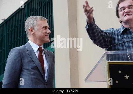 L'acteur Christoph Waltz (L) réagit aux commentaires par le réalisateur Quentin Tarantino lors d'une cérémonie de dévoilement honorant Valse avec la 2,536ème étoile sur le Hollywood Walk of Fame à Los Angeles le 1 décembre 2014. UPI/Jim Ruymen Banque D'Images