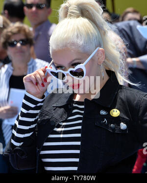 Christina Aguilera, l'acteur la voix de Akiko dans le Glitter animated motion photo comédie 'l'Emoji' assiste à la première du film au Regency Village Theatre dans la section de Westwood Los Angeles le 23 juillet 2017. Scénario : Gene, un emoji expressionnelle, définit un parcours pour devenir un emoji normal. Photo par Jim Ruymen/UPI Banque D'Images