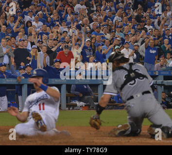 Colorado Rockies first baseman Mike Moustakas (11) in the sixth inning of a  baseball game Wednesday, April 12, 2023, in Denver. (AP Photo/David  Zalubowski Stock Photo - Alamy