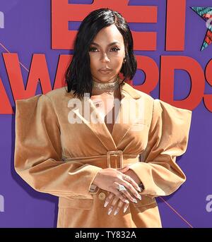 Singer Ashanti assiste à la 18e conférence annuelle de Microsoft à BET Awards Theatre de Los Angeles le 24 juin 2018. La cérémonie célèbre les réalisations dans le domaine du divertissement et rend hommage à la musique, les sports, la télévision et les films publiés entre le 1er avril 2017 et le 31 mars 2018. Photo par Gregg DeGuire/UPI Banque D'Images