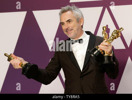 Alfonso Cuaron, gagnant du meilleur film en langue étrangère, meilleur réalisateur et Meilleure Photographie pour 'Roma' apparaît, avec ses coulisses pendant la 91e Oscars Awards à l'hôtel Loews Hollywood Hotel dans la section Hollywood de Los Angeles le 24 février 2019. Photo de John Angelillo/UPI Banque D'Images