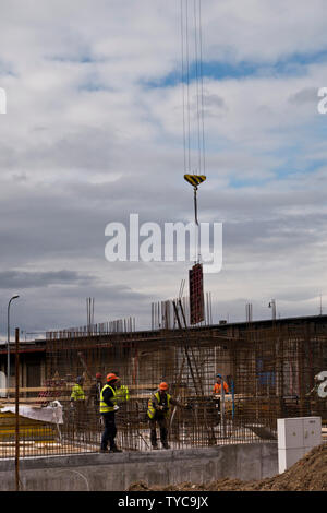 Les travailleurs sur un chantier de construction Banque D'Images